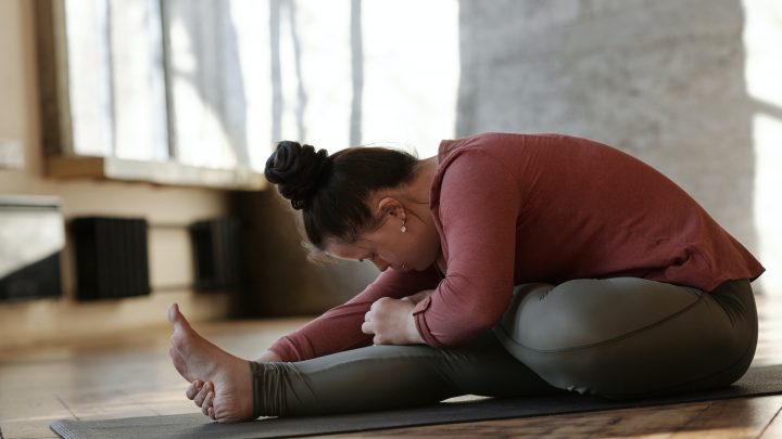 person stretching and breathing