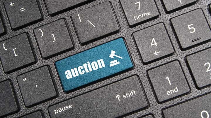 computer keyboard with auction button