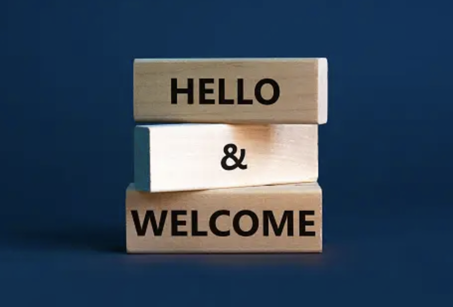 Image of 3 blocks, stacked saying Hello and Welcome